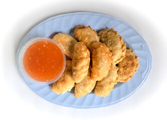 Food called Jalankote, typical of Makassar, South Sulawesi with a white background and delicious chili sauce