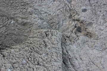 hard unformed concrete spilled on the ground