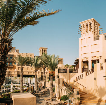 View of Madinat Jumeirah Arabian Resort. It is the largest resort in the Emirate. View of windcatcher in sunny summer day in district of Madinat Jumeirah. Panorama, panoramic view