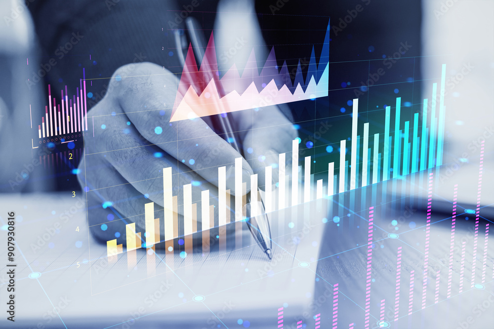 Poster double exposure of hand with pen and financial graphs on a futuristic background.