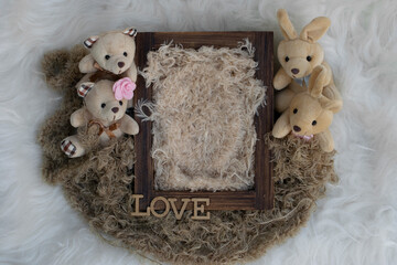 Newborn digital backdrop with wooden box, teddy bear and rabbit on fur white background. Newborn...