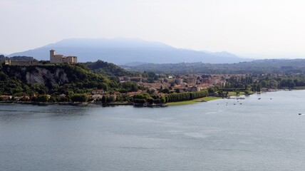 Fototapeta premium Angera on lake Maggiore, Lombardy, Italy. Aerial view of città Angera