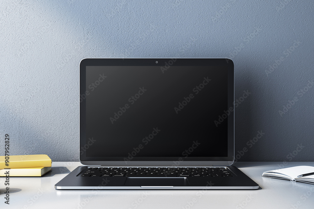 Aufkleber modern laptop with blank screen on a desk, books and notebook beside it. 3d rendering
