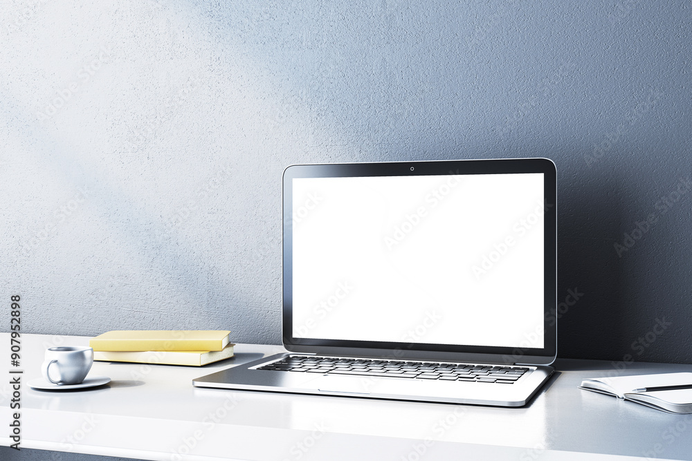 Poster modern laptop with blank screen on desk with books and coffee cup. 3d rendering
