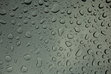 Rain drops on window on the rainy day