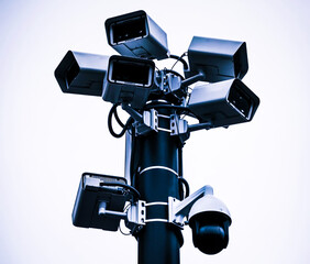 CCTV on the wall, monitoring the street and crime, Creepy or spooky atmosphere