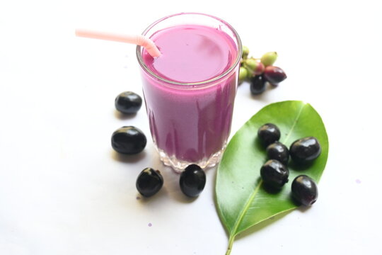 Syzygium cumini fruits juice. Its other names Malabar plum, Java plum, black plum, jamun and  jambolan. This fruit have anti diabetic properties. Indian jamun juice. Healthy drink. Fruit juice.