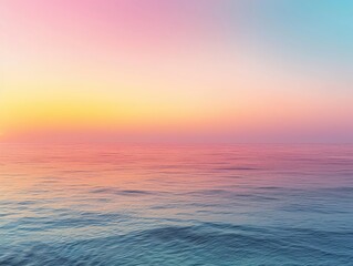 Obraz premium A serene ocean view at sunset, showcasing calm waters and a gradient sky of soft pink and blue hues for a tranquil atmosphere.