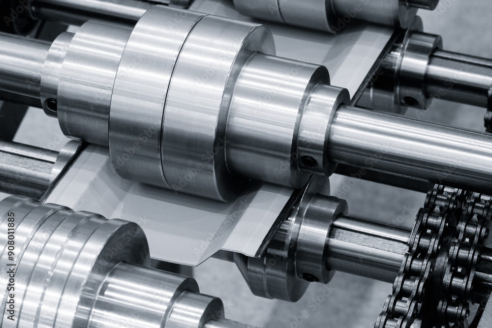 Poster A machine with a chain and gears is being used to make a product. Concept of precision and efficiency, as the machine is designed to create a product with accuracy and speed. The use of metal
