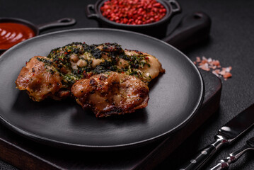 Grilled boneless chicken thigh with salt, spices and herbs