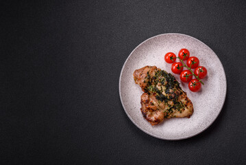 Grilled boneless chicken thigh with salt, spices and herbs