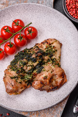 Grilled boneless chicken thigh with salt, spices and herbs