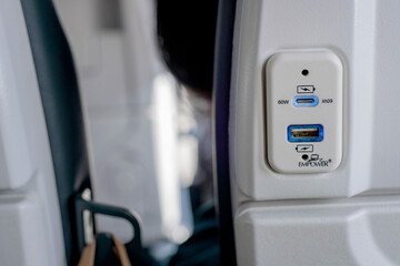 USB port at the seat of plane for charging the electronics devices while traveling.