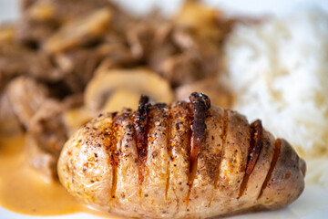 Traditional filet mignon stroganoff with rustic potatoes