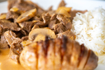 Traditional filet mignon stroganoff with rustic potatoes
