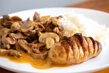 Traditional filet mignon stroganoff with rustic potatoes