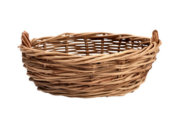 Obraz premium classic wicker basket woven from natural willow branches, with a warm, rustic appearance. Isolated on white background