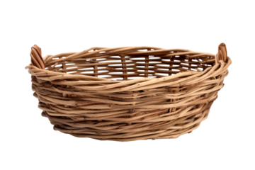 classic wicker basket woven from natural willow branches, with a warm, rustic appearance. Isolated on white background