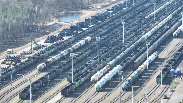 Freight train terminal. A freight train runs on the tracks.
