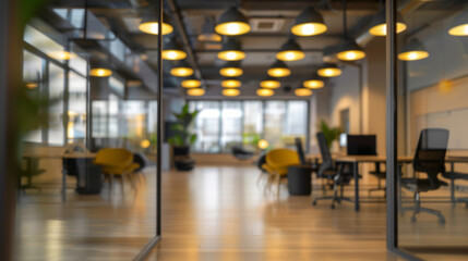 Blurred modern office interior design with glass walls and lighting. A modern office space features glass walls, stylish furniture, and warm lighting, creating an inviting and productive workspace.