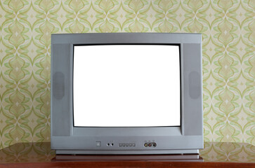 Antique TV with white screen on antique wooden cabinet, vintage design in 80s and 90s style house.