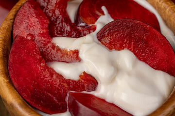 yogurt made from milk and red ripe plum