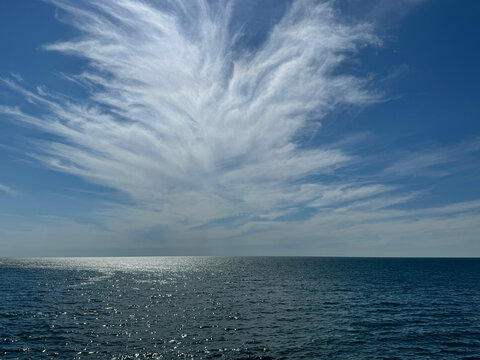 Amazing sky cloud above sea shiny blue water