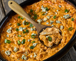 hot buffalo chicken dip in baking dish, top view
