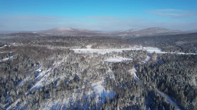 Aerial Footage of Mountain Cottages and Cabins After Fresh Snowfall -  Pittsburg, New Hampshire, USA