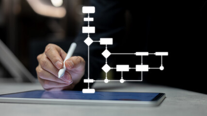 close up marketer employee hand use stylus pencil to draft or draw about process of  solving...