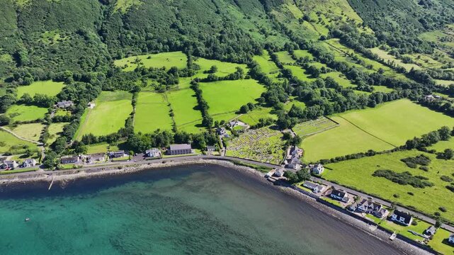 Aerial View of St Patrick & St Bridgid Rc Church Glenariff Glen at Waterfoot Village Co Antrim Northern Ireland sunny day 