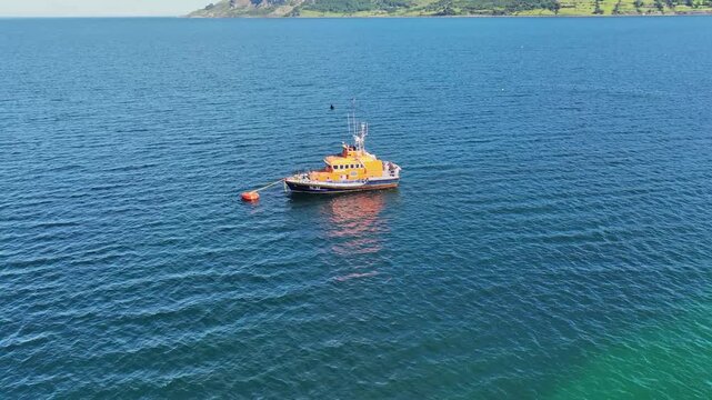 Aerial View of RNLI Lifeboat Red Bay Cushendall on the Irish Sea Co Antrim Northern Ireland on a sunny day with a blue sky 27-07-24 
