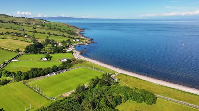 Aerial View of Robert Emmets GAC Cushendun Hurling Pitch Cushendun Village Co Antrim Northern Ireland 27-07-24