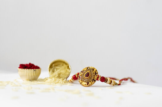 Rakshabandhan festival photos with white tabletop and rakhi roli rice