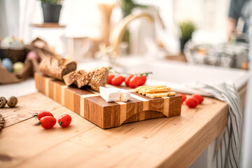 sliced snacks on a wooden board