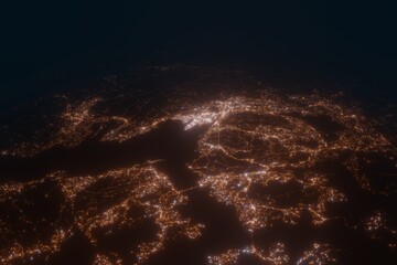 Aerial view on Bergen (Norway) from west. Top view on modern city at night from space