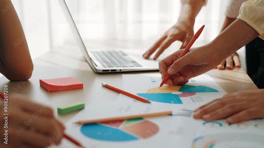 Poster startup company employee working together using laptop analyzing bi dashboard paper on financial dat