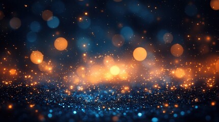 Fototapeta premium A mesmerizing array of glowing blue and gold bokeh lights creating a magical atmosphere.