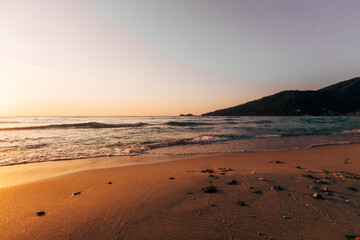 a sunset on the sea beach