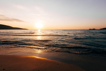 a sunset on the sea beach