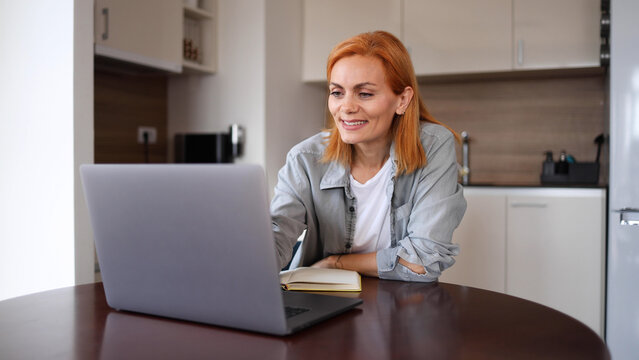 Happy woman planning her work from home