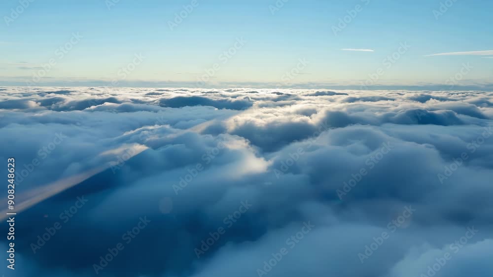 Poster a birdseye view of layers of clouds stretching as far as the eye can see disappearing into the dista