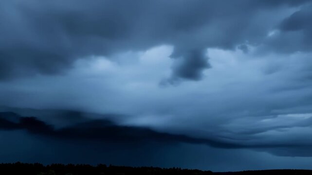 The air is heavy and still as towering thunderheads stack on top of each other ready to unleash their fury.