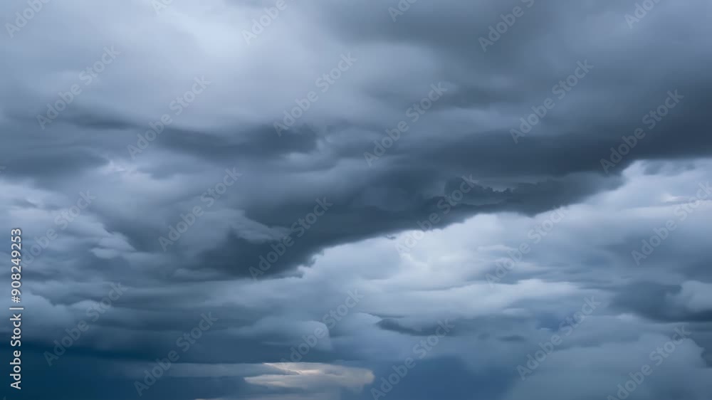 Poster the sudden shift in winds causes the rolling clouds to billow and swirl forewarning of a fierce stor
