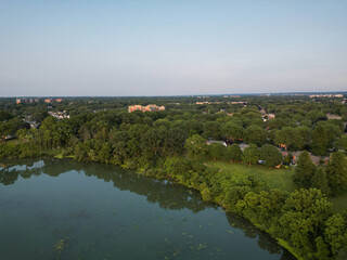 Aerial shot over Martindale Pond, Royal Henley Park and the northside of St. Catharines, Ontario, Canada during summer July, 2024.