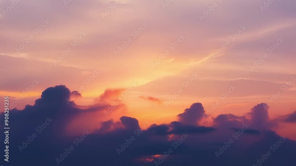 Poster the transition from darkness to light as the sun rises above the clouds and paints the sky with an a