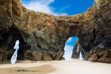 Natural rock arches Cathedrals beach, Playa de las Catedrales at Ribadeo, Galicia, Spain © Aleh Varanishcha