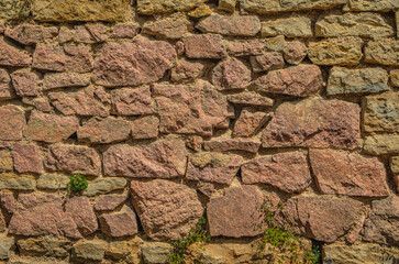stone wall, texture, Medieval natural stone wall, pink granite, French masonry stone wall, background for photo.