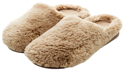 Closeup of beige slippers isolated on transparent background. Fluffy warm soft and cozy material home or house footwear, pair of comfortable female indoor shoes, casual wear