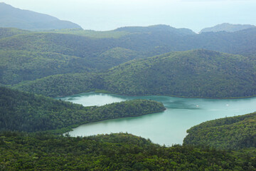 Aerial view of an inlet on the west coast of Whitsunday Island in the Whitsunday Islands National Park in Queensland, Australia